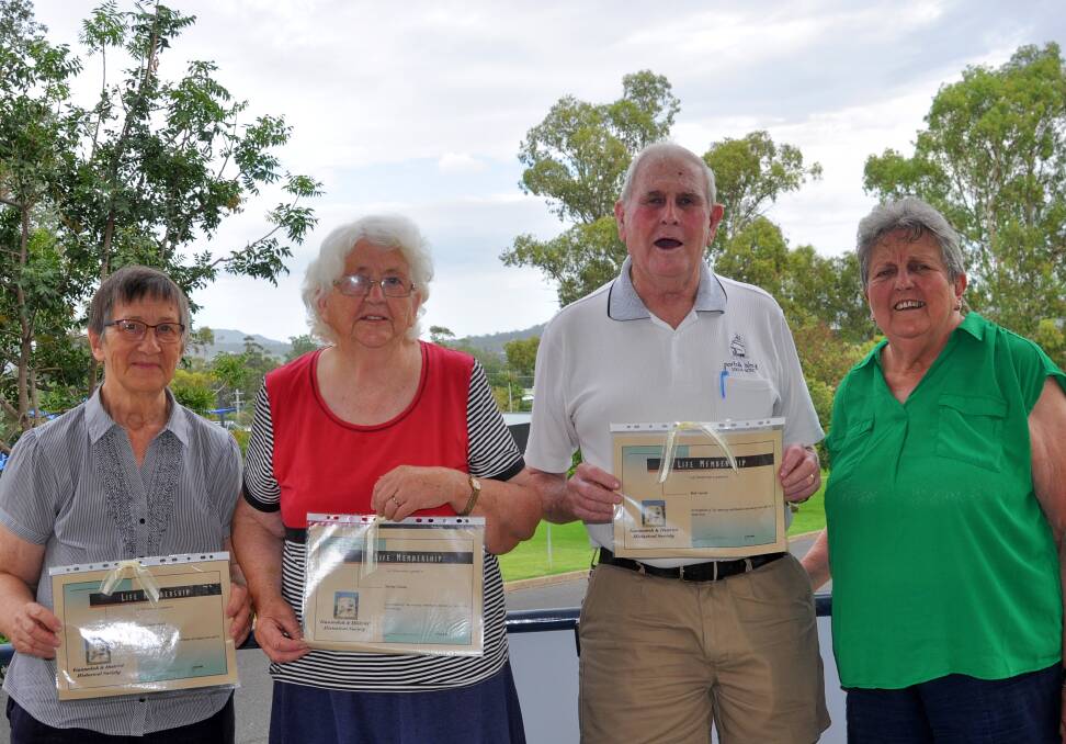 Life membership: Gunnedah and District Historical Society members Esther Underwood, Shirley Coote and Bob Leister, pictured with vice-president Kay Wilson, right, who presented the awards. Absent: Don Underwood. Photo: Marie Hobson