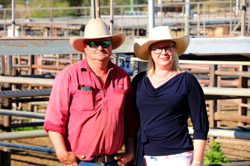 Beef and sheep producer Peter McArthur with his wife and Gunnedah Chamber of Commerce president Juliana McArthur at the saleyards funding announcement on Tuesday.