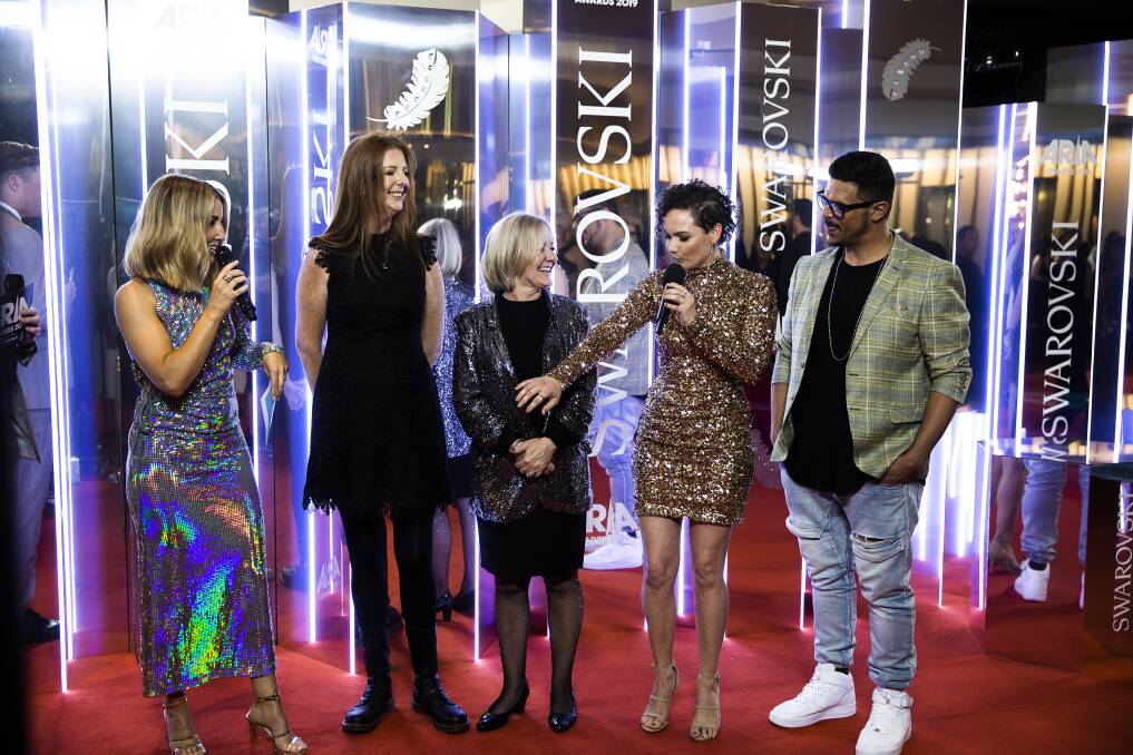 Julia Rennick (centre) with her fellow nominees and red carpet host Jules Egan. Photo: ARIA Awards