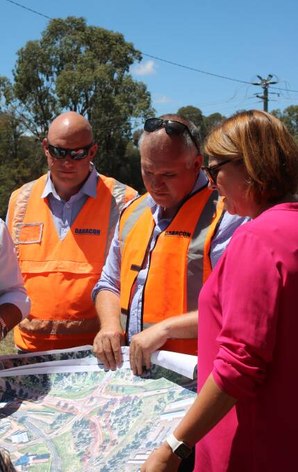 Daracon Group's construction manager Adam King and project manager Simon Flannery with Minister for Roads, Maritime and Freight Melinda Pavey in Gunnedah on Friday.