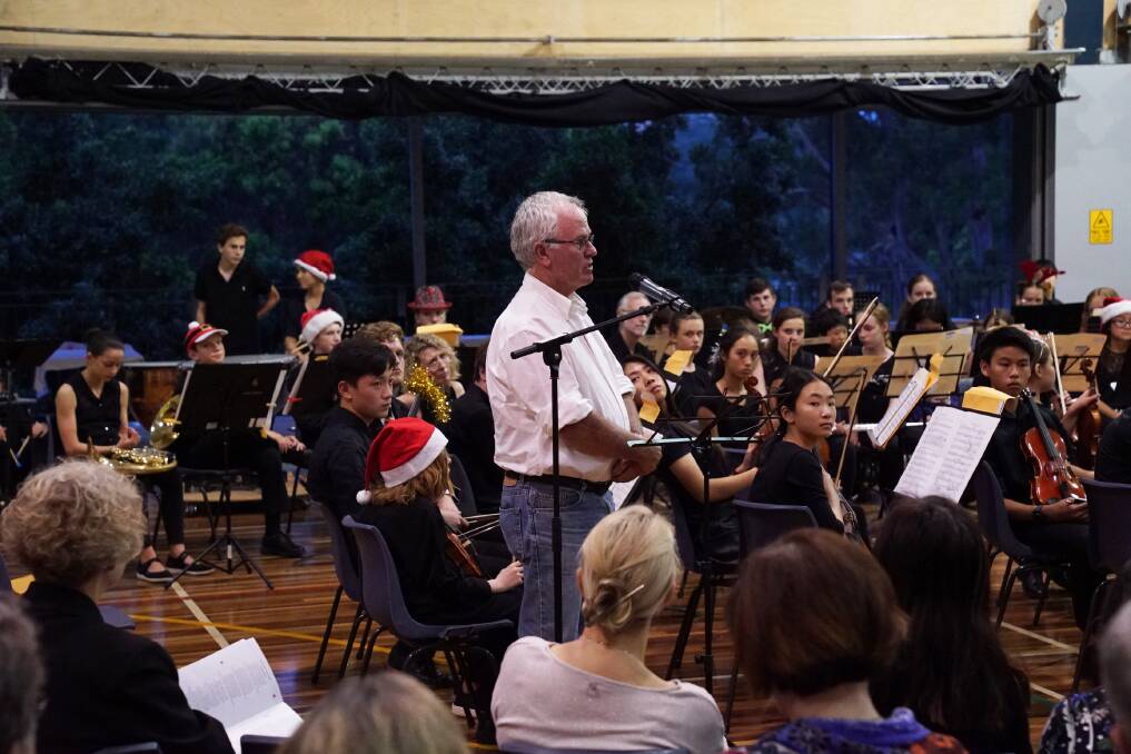 Mullaley farmer Andrew Frend addresses the audience at the Red Earth Christmas Concert. Photo: Janet Merewether