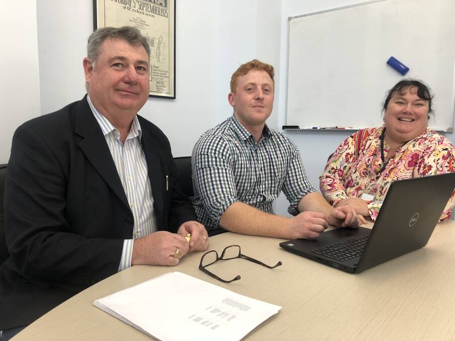 Liverpool Plains Shire Council's Ian George and Donna Ausling meet with technical specialist Tom Hayford at the Telstra Business Centre Tamworth to discuss the next steps in the Telecommunications Outreach Program. Photo: supplied