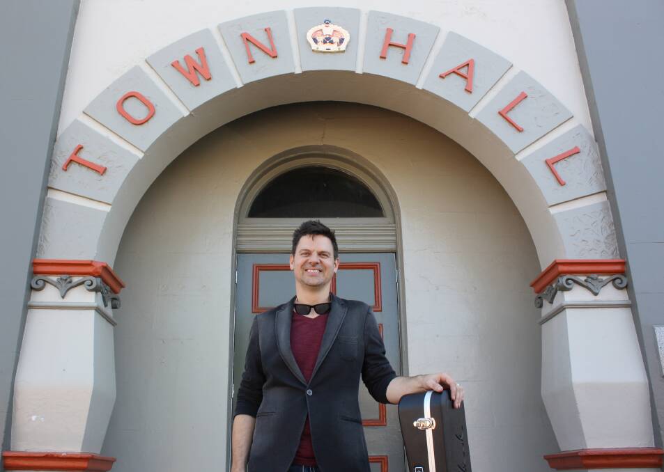 Musician Anthony Snape outside the Gunnedah Town Hall when he visited in 2016. He is based in Nashville.