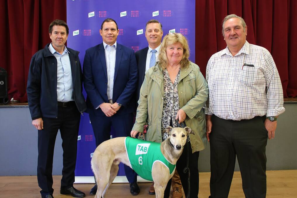 Minister responsible for racing, Kevin Anderson, GRNSW's Tony Mestrov, Gunnedah shire mayor Jamie Chaffey, Gunnedah greyhound trainer and owner Cherie Rosier, "Wolfie" the greyhound, and GBOTA director Geoff Rose at the regional launch of the Million Dollar Chase event in Gunnedah on Friday.
