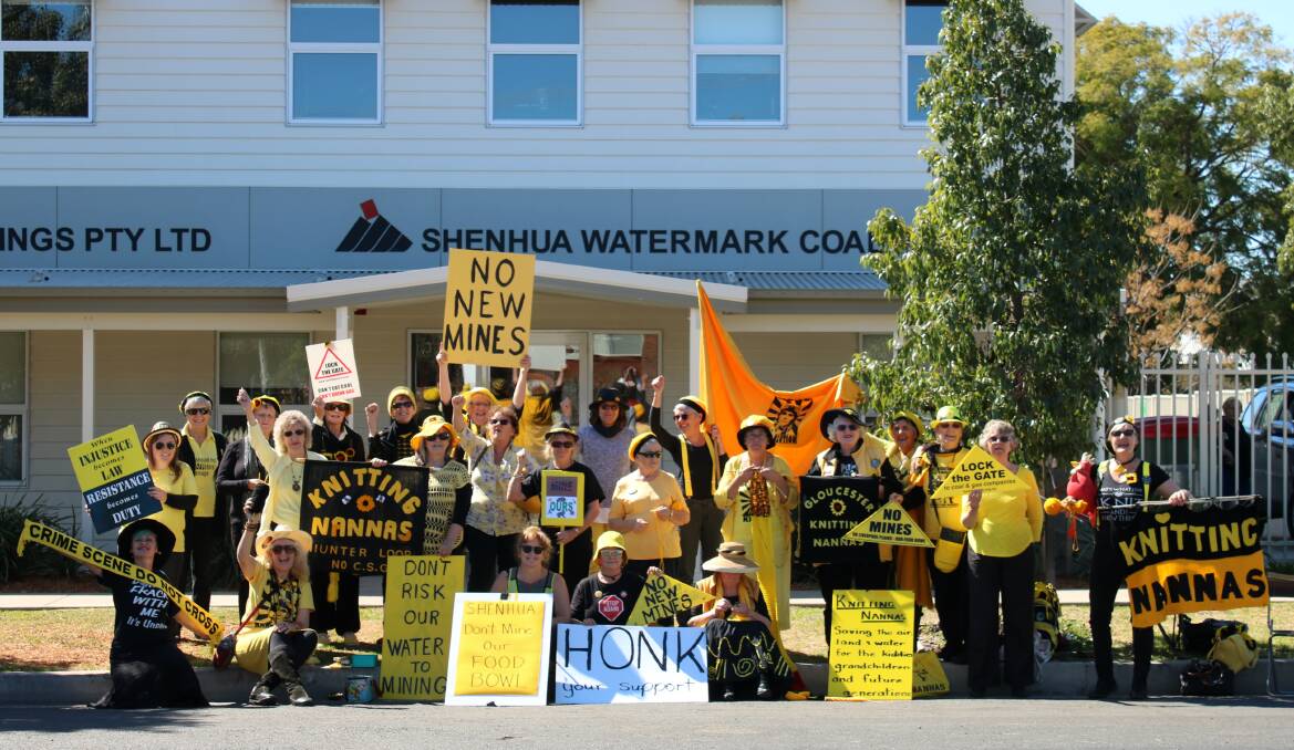 The Knitting Nannas display their anti-mining message outside the Shenhua Watermark Coal office in Gunnedah during AgQuip.
