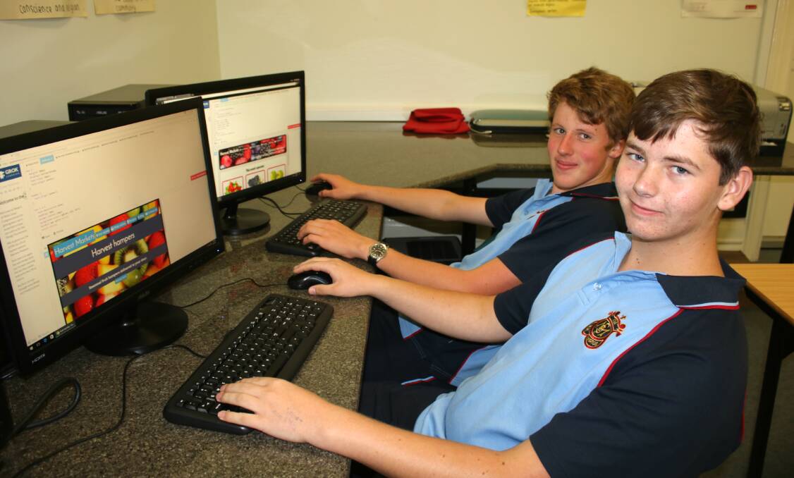 PROBLEM SOLVERS: St Mary's students Zac Bower and Caleb Mansfield are in their element when it comes to computer coding.