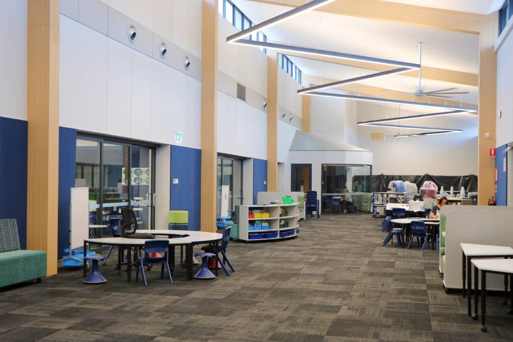 The main shared space runs down the middle of the classrooms.