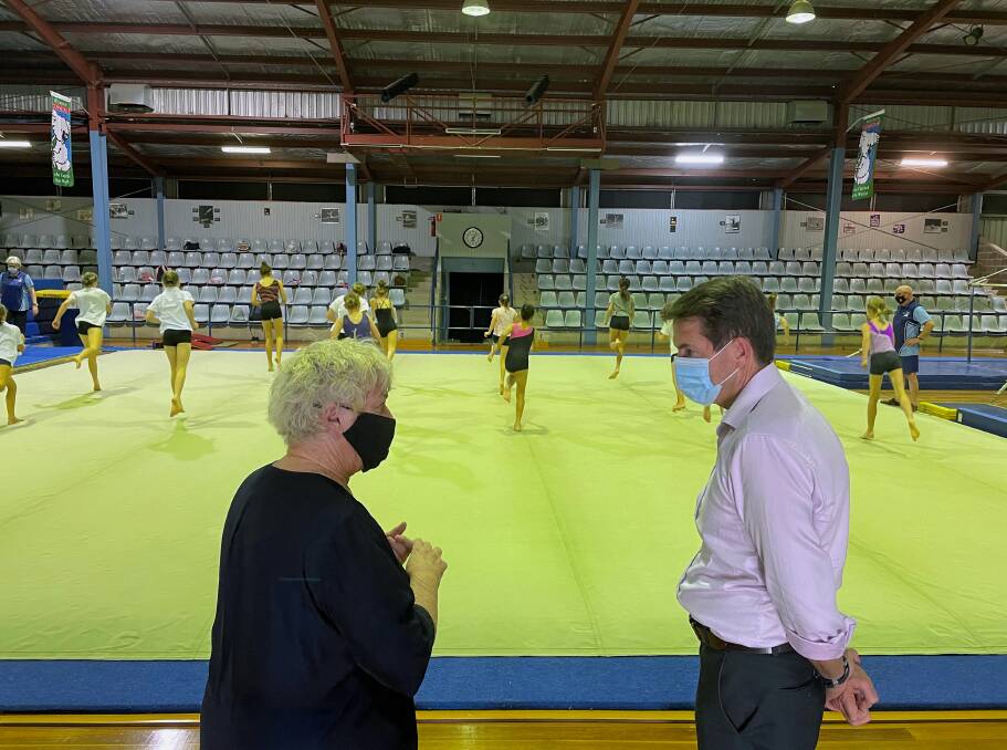 Gunnedah Gymnastics committee member Desley Ewing with Tamworth MP Kevin Anderson at the centre, which will be fitted with solar panels. Photo: supplied