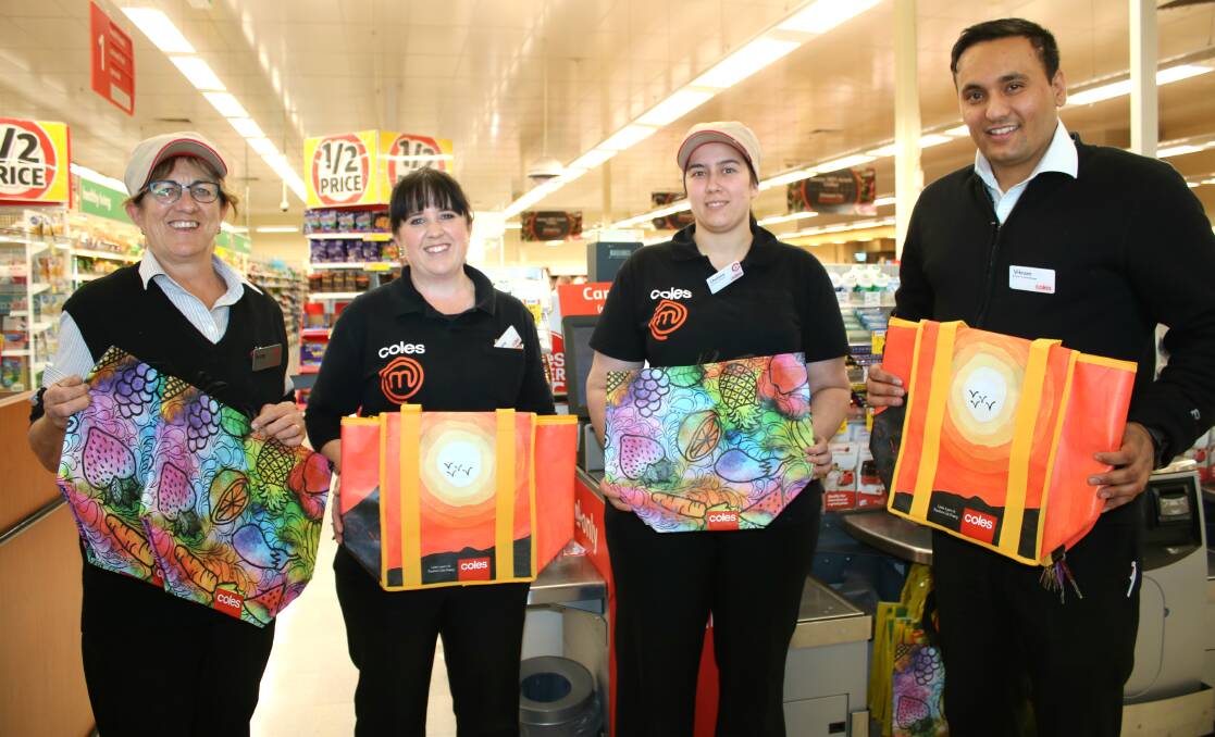 Kerry Wise, Hunny Payne, Chelsea Mudaliar and manager Vikram Singh with some of the reusable bags, which are for sale at Coles Gunnedah.