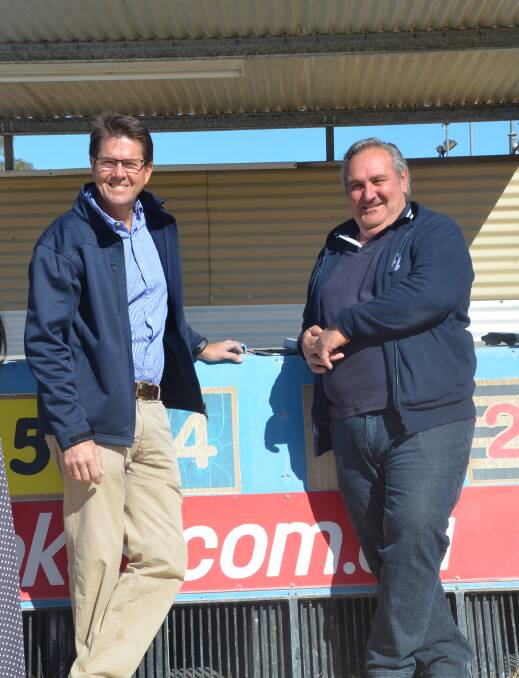 Minister for Better Regulation and Innovation and Racing Kevin Anderson and Greyhound Breeders, Owners and Trainers Association director Geoff Rose at the Gunnedah track.