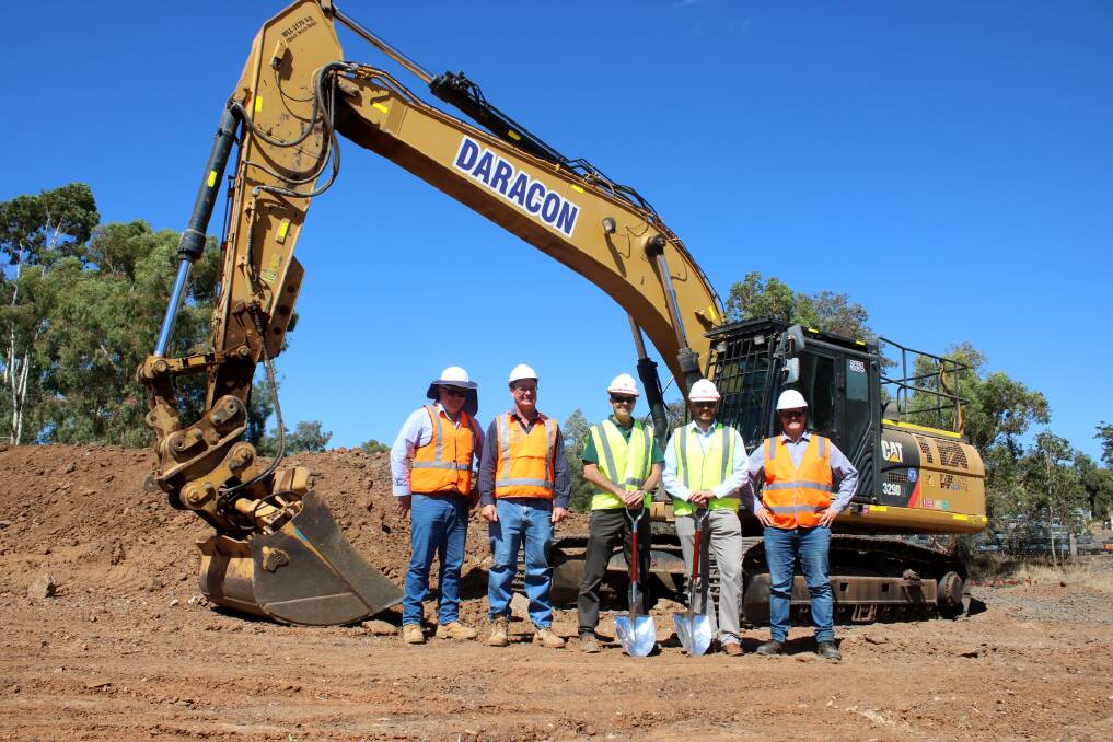 Daracon and Road Maritime Services' meet with Tamworth MP Kevin Anderson and Gunnedah Shire Council's Jeremy Bartlett at the site of the rail overpass on Monday.
