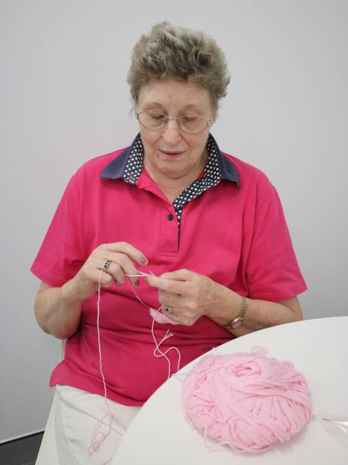 Yvonne Argent knitting a prosthetic.