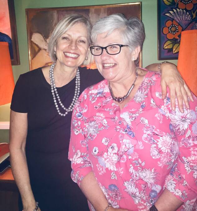 Former Gunnedah woman Julie Thompson and Curlewis woman Angela McCormack catch up at the book launch.
