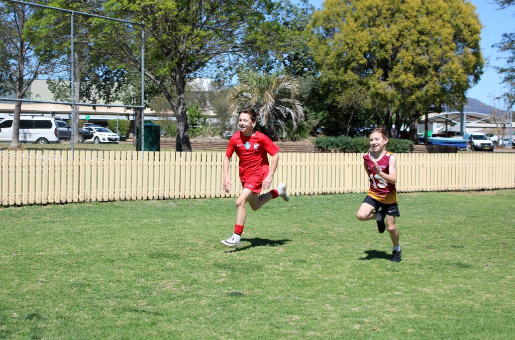 Jayden and Cleal Bender on the move at Wolseley Oval.