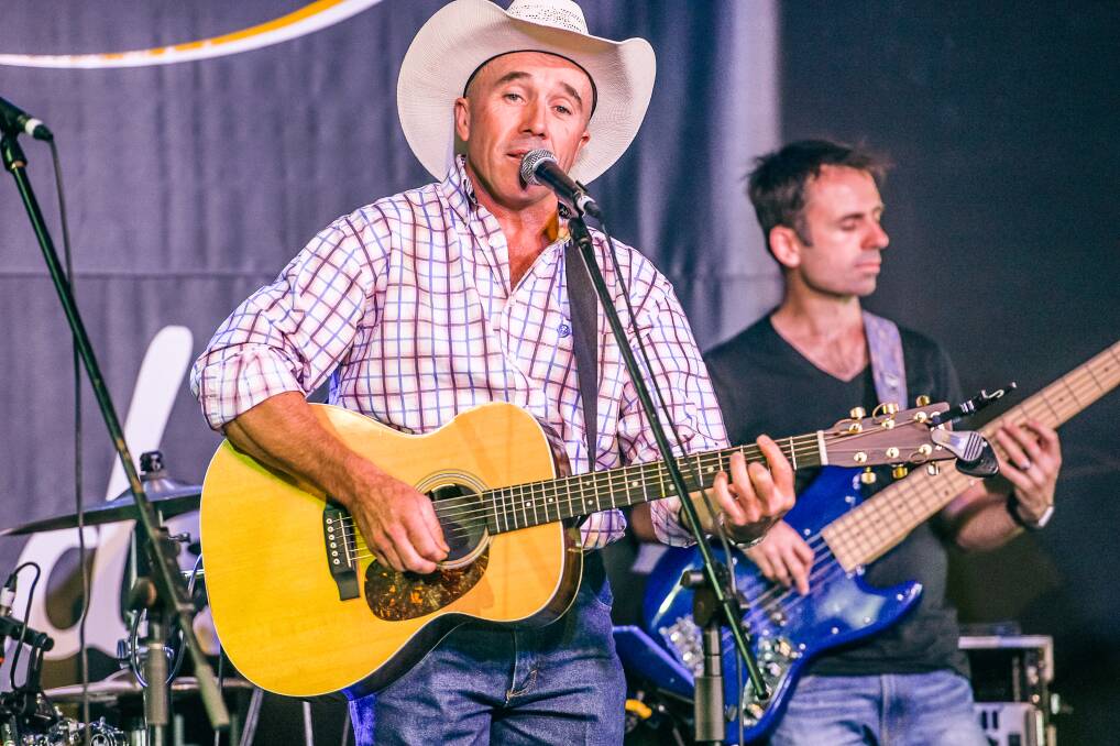 Former Gunnedah musician Dan Murphy performing at the Tamworth Country Music Festival. Photo: Shotz by Jackson