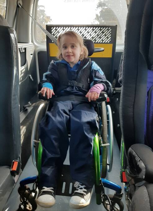 Lucy can stay in her wheelchair for car trips now. Photo: supplied