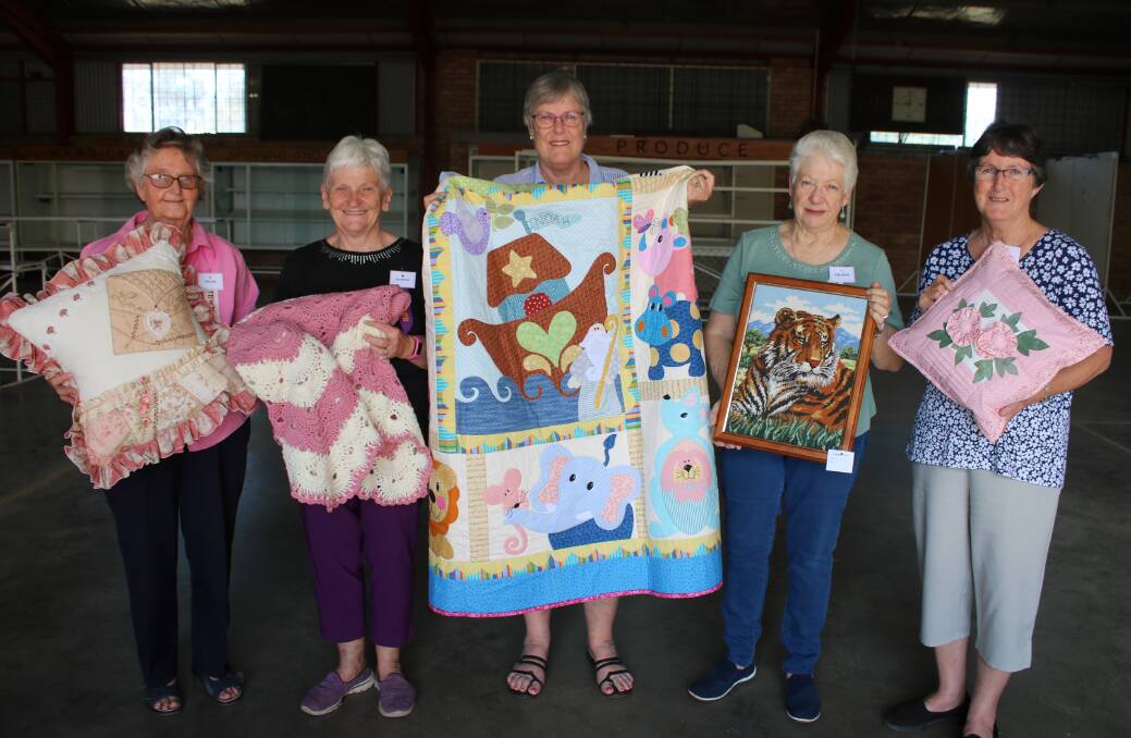 Needlwork stewards Hilda Morris, Olwyn Jones, Lesley Idzerda, Arleen Ison and Jenny Duncan with entries for this year's show. Needlework is just one of the handicrafts on display in the Griffiths Pavilion.