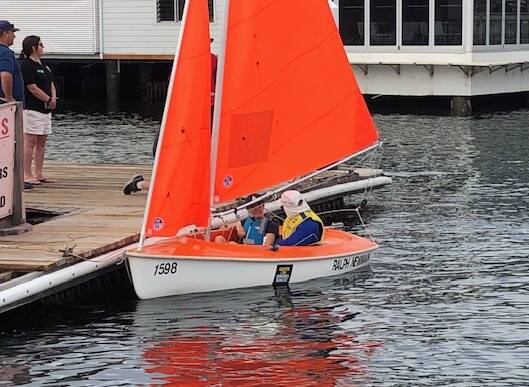 The kids hit the water in sailing boats.
