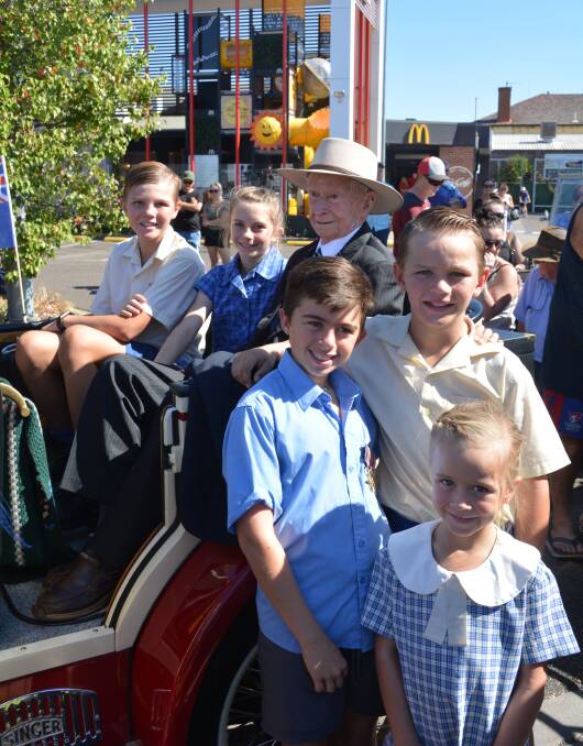 Snow with his great grandchildren on Anzac Day this year.