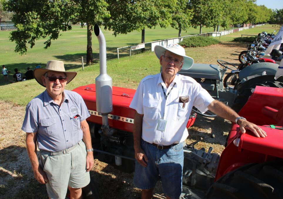 Gunnedah Rural Museum members Jim Noon and Kel Archibald with a vintage Ferguson tractor.