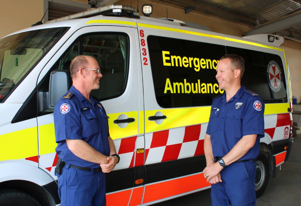 Outgoing Gunnedah ambulance station officer Scott Clarke with incoming officer Derek Baker.