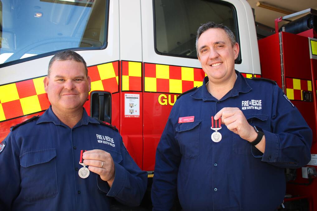 Adrian Melick and Andrew Johns with their long service and good conduct medals. They both joined Fire and Rescue NSW in November 2008.
