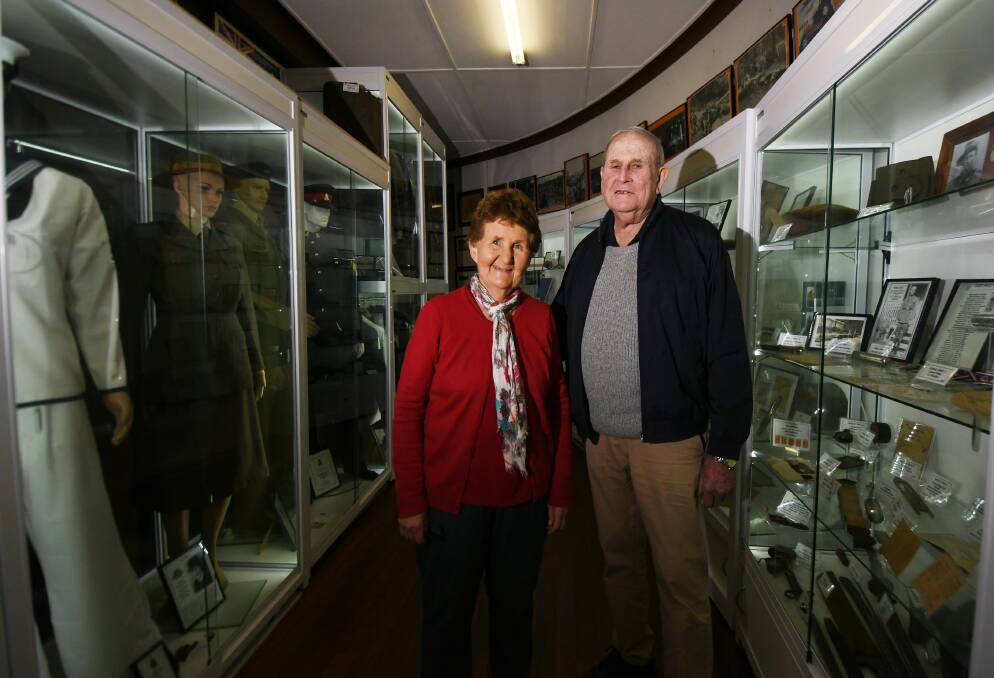 Gunnedah and District Historical Society's Marie Hobson and Bob Leister with the Vietnam War display at the water tower museum.