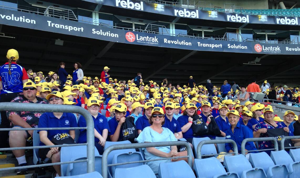 CHEER SQUAD: GS Kidd Memorial School students and staff watching the Invictus Games in Sydney last week. Photo: Supplied