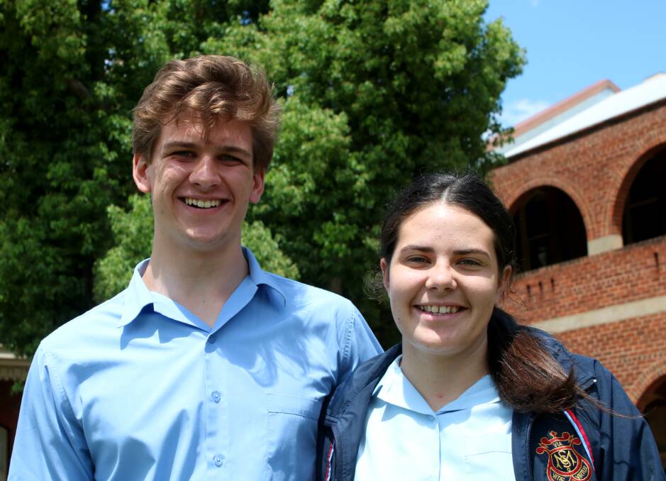 ONE DOWN: Year 12 students Max Crowhurst and Grace Jaeger at St Mary's after their first HSC exam. Photo: Vanessa Höhnke