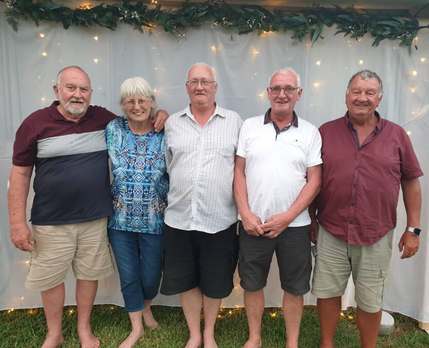 Brenda Woods (nee Hogg) with her husband Mike, and brothers Barrie, David and Michael at her 70th birthday party. Photo: Supplied