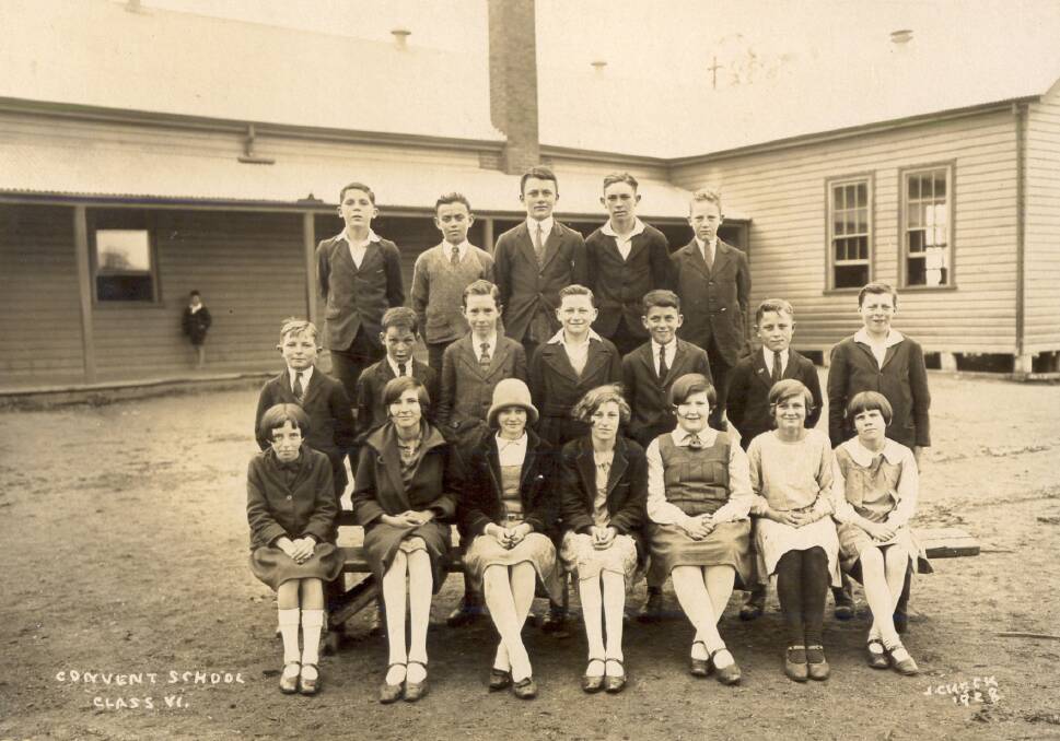 Year six in front of St Xavier’s School in 1928. Ossie Campbell is third from the left in the middle row and his twin Joyce is second from the left in the front row.