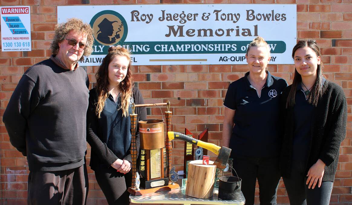 ICONIC TRADITION: Billy boiling competition co-organiser Sid Knight and The Railway Hotel's Grace Areces, Suzi Beard and Brontee Toma with the trophies.