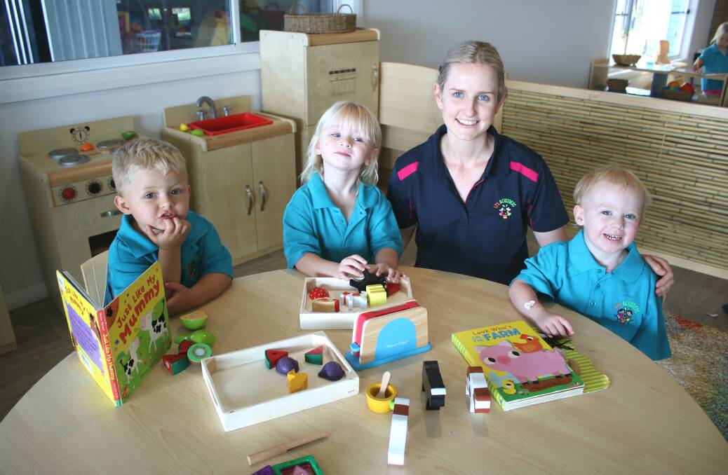 NEW SPACE: Jesse Wilkin, Martina Woodlands and Grace Hoppe with new childcare educator Emma Randle in the new junior pre-school room. Photo: Vanessa Höhnke