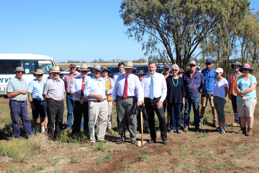 Parkes MP Mark Coulton and Gunnedah shire mayor Jamie Chaffey with council staff and Mullaley residents at the sod-turning on Friday.