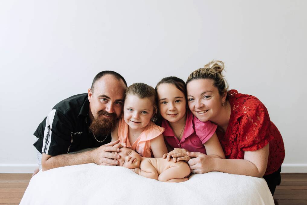 Andrew, Chloe, Sophie and Cassie Lane with baby Kiara. Photo: Finishing Image Photography