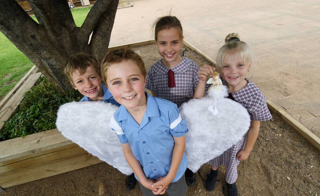 St Xavier's will wing its way to Carols in the Park on December 7. Pictured are Year 1 students Lachlan Goodworth, Sam Davis, Lexi Whitton and Isla Budden. Photo: Gareth Gardner