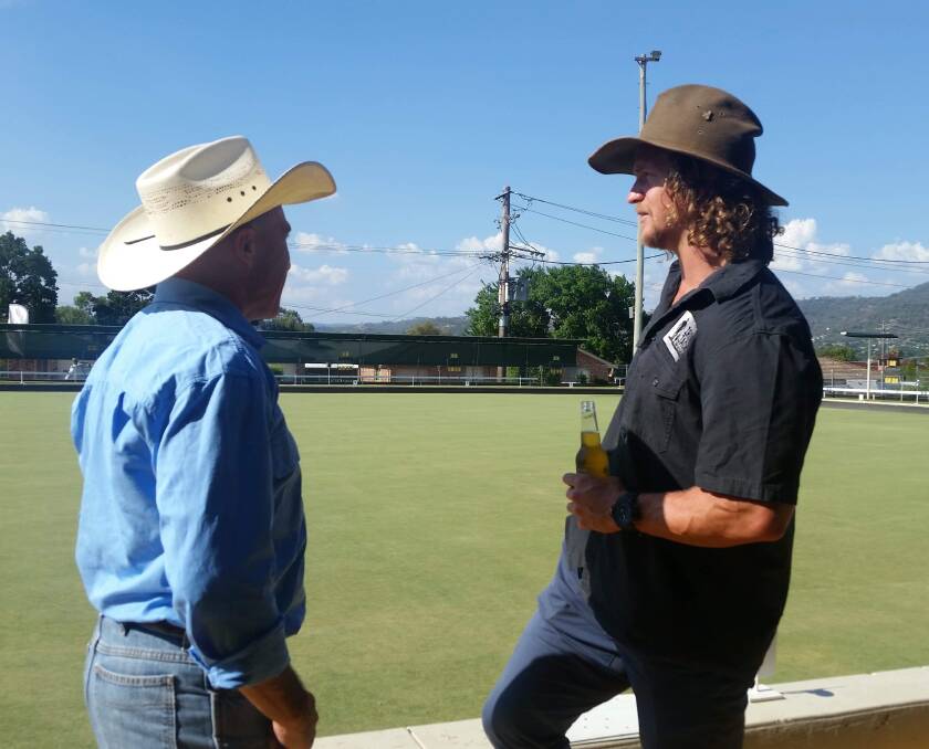 Murphy and the Honey Badger have a beer at the bowlo. Photo: 