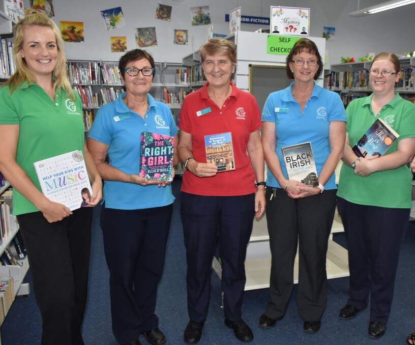 Librarian Christiane Birkett, centre, with fellow staff Gina Torrens, Yvonne Reading, Robyn Draper and Fiona Sills. Photo: supplied
