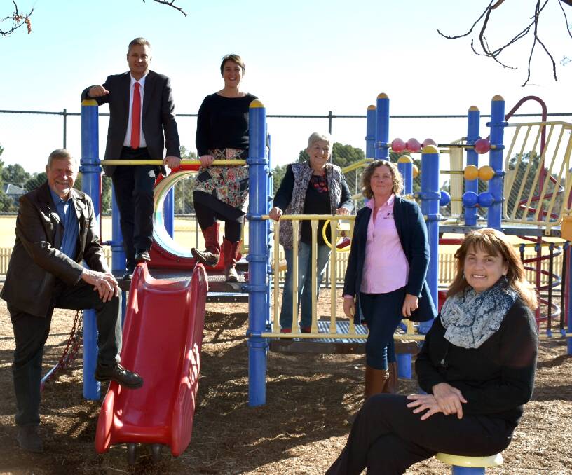 Gunnedah mayor Jamie Chaffey, councillors Owen Hasler and Colleen Fuller with working group members Rebecca Ryan, Rebecca Dridan and Debra Hilton at Wolseley Park where the playground will be built. Photo: Supplied