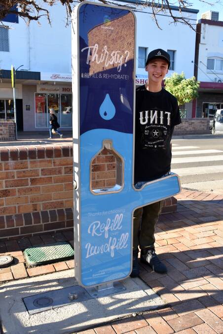 Local youth Jesse Dick with the new water refill station in the CBD. Photo: supplied