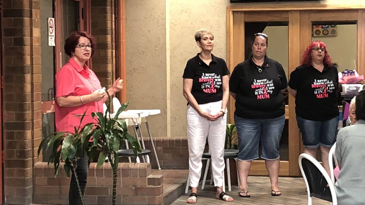 McGrath Breast Care Nurse Nerridah Prentice speaks at the fundraiser on Saturday. Pictured are event organisers Melissa Powell, Heidi Knight and Sally Keeler.