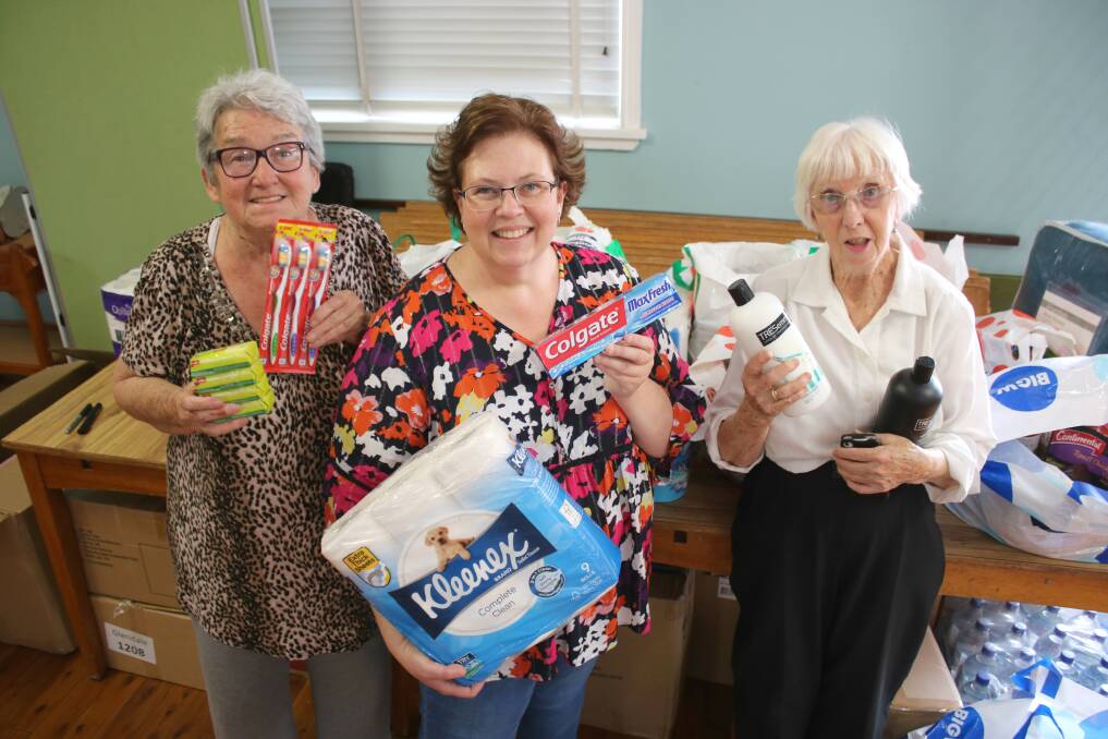 Gunnedah CWA Jill Andrews, Jo Slee and Marie O'Gorman with some of the items that have been donated for drought hampers.