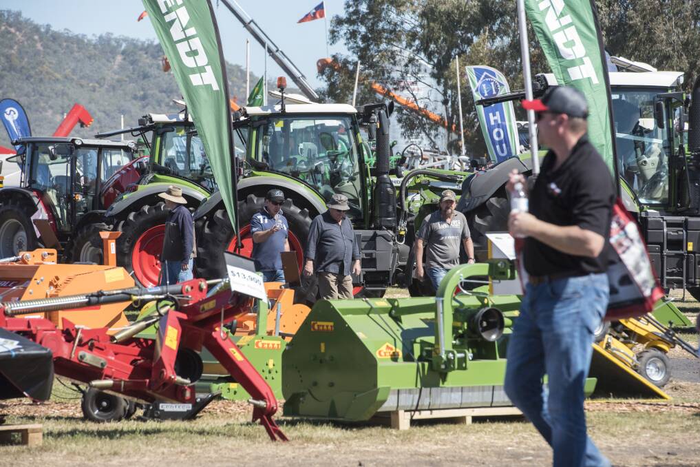Talking business at AgQuip in 2017. Photo: Peter Hardin