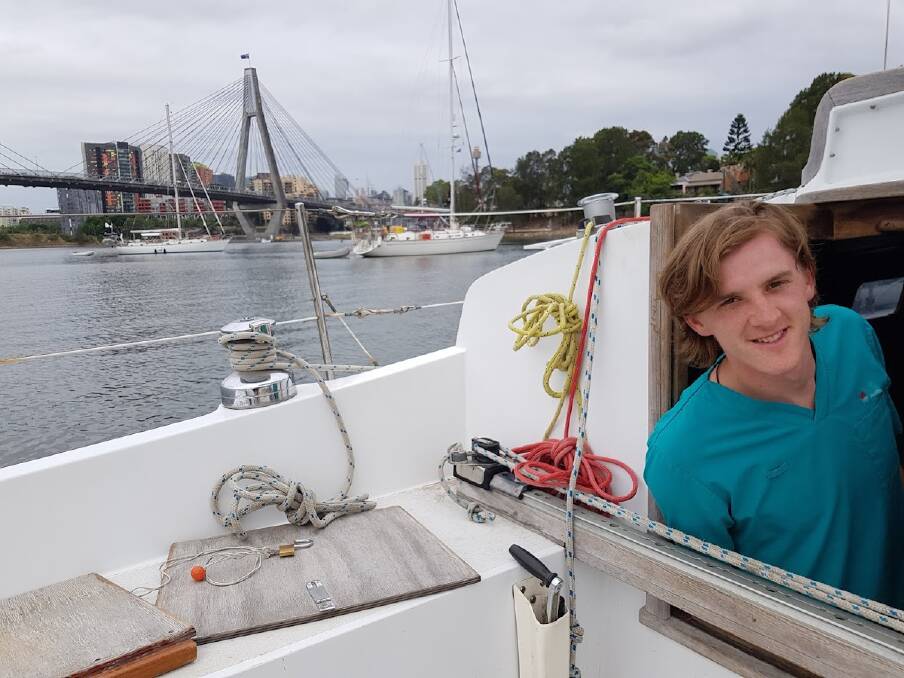 MAN AT SEA: Andrew Brazier is working hard to prepare his sailing boat for a trip across the Pacific. Photo: Supplied
