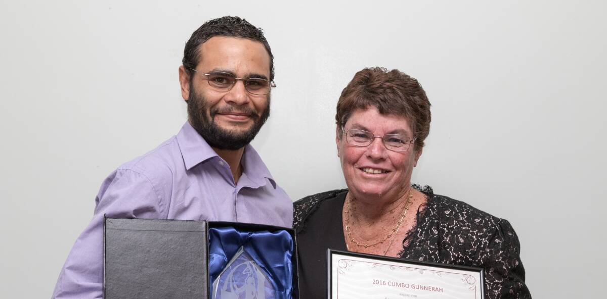 HONOURED: NAIDOC awards announcer Gary Briggs presents Sue Sutherland with a community contribution awarded. Photo: Nick Clark Photography