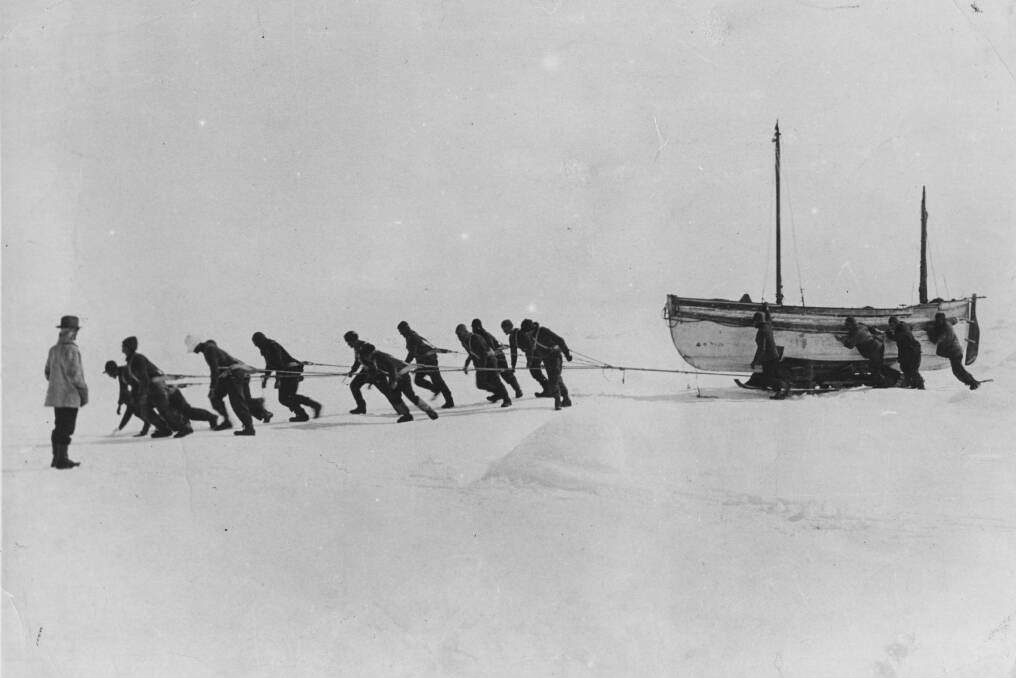 Members of an expedition team led by Sir Ernest Henry Shackleton pull one of their lifeboats across the snow in the Antarctic, following the loss of the 'Endurance' in 1916. Picture: Getty Images