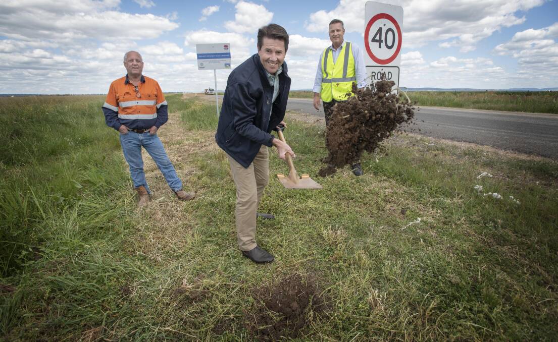 NEW BEGINNINGS: Tamworth MP Kevin Anderson, Gunnedah Shire mayor Jamie Chaffey and Liverpool Plains Shire mayor Andrew Hope turned the very first sod on the Mystery Road upgrade on Monday. Photo: Peter Hardin