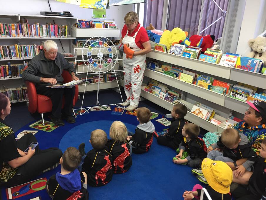 A GOOD READ: Children and staff from Winanga-Li Aboriginal Child and Family Centre joined members of the Gunnedah Shire Library for National Simultaneous Storytime. 
