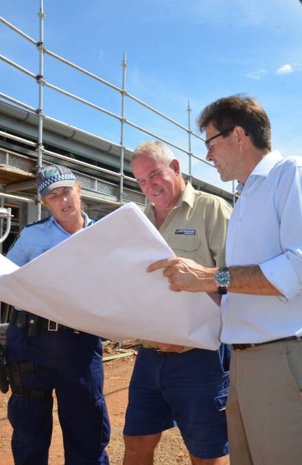 UNDER WAY: Bree Olsen, Patterson Group's Bob Mudie and Tamworth MP Kevin Anderson take in the progress of the Gunnedah Police Station upgrade. Photo: Billy Jupp