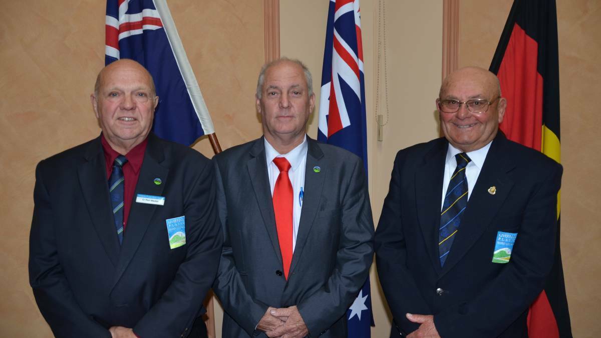 CHANGING OF THE GUARD: Paul Moules (left) and Doug Hawkins (right) will be vying for the mayor's role vacated by Andrew Hope (middle). Photo: Billy Jupp 